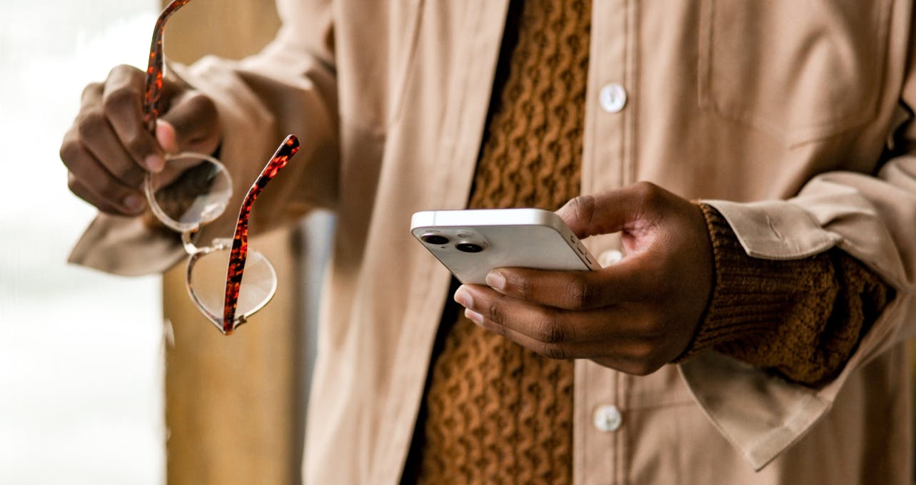 Hand holding a mobile phone