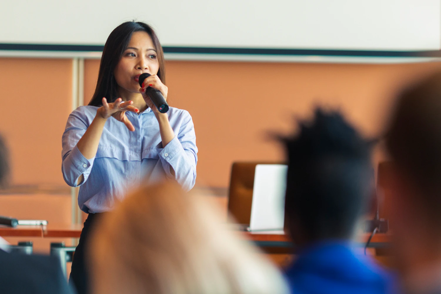 Audience attending a customer experience conference — best CX conferences 2026 buyer's guide