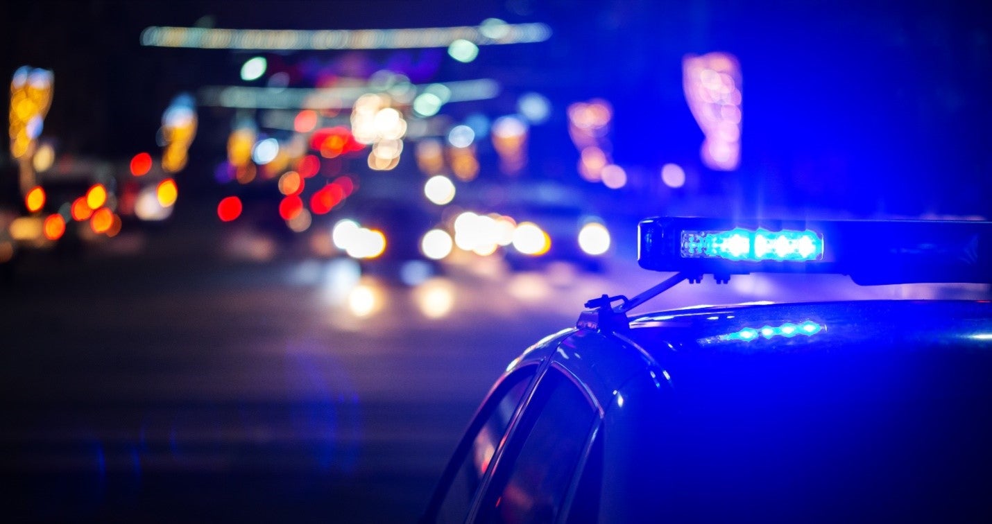 Police car on night patrol