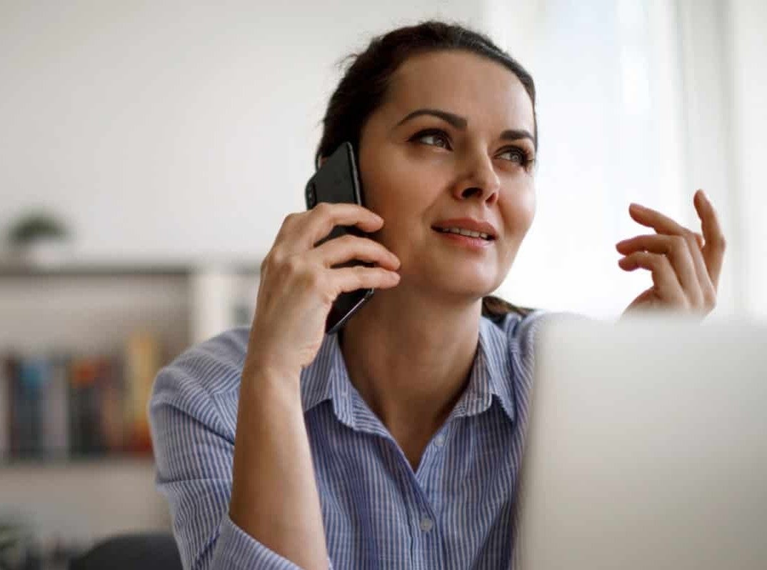 woman on phone at home