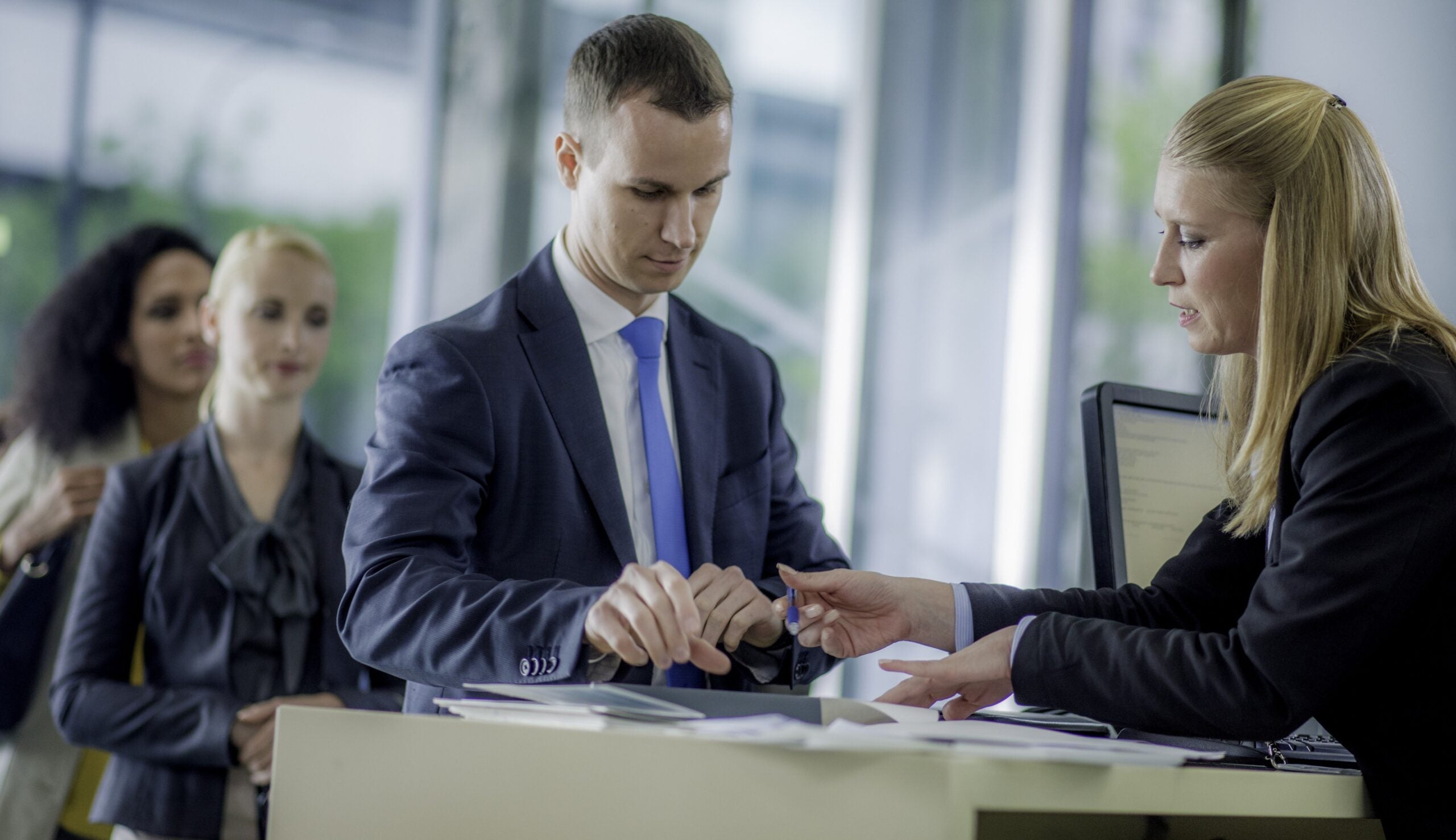 Customer receiving help at a bank