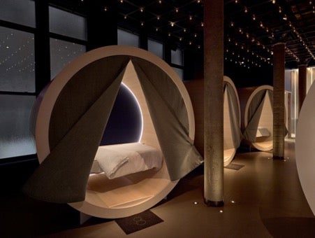 A unique modern space with beds in circular structures