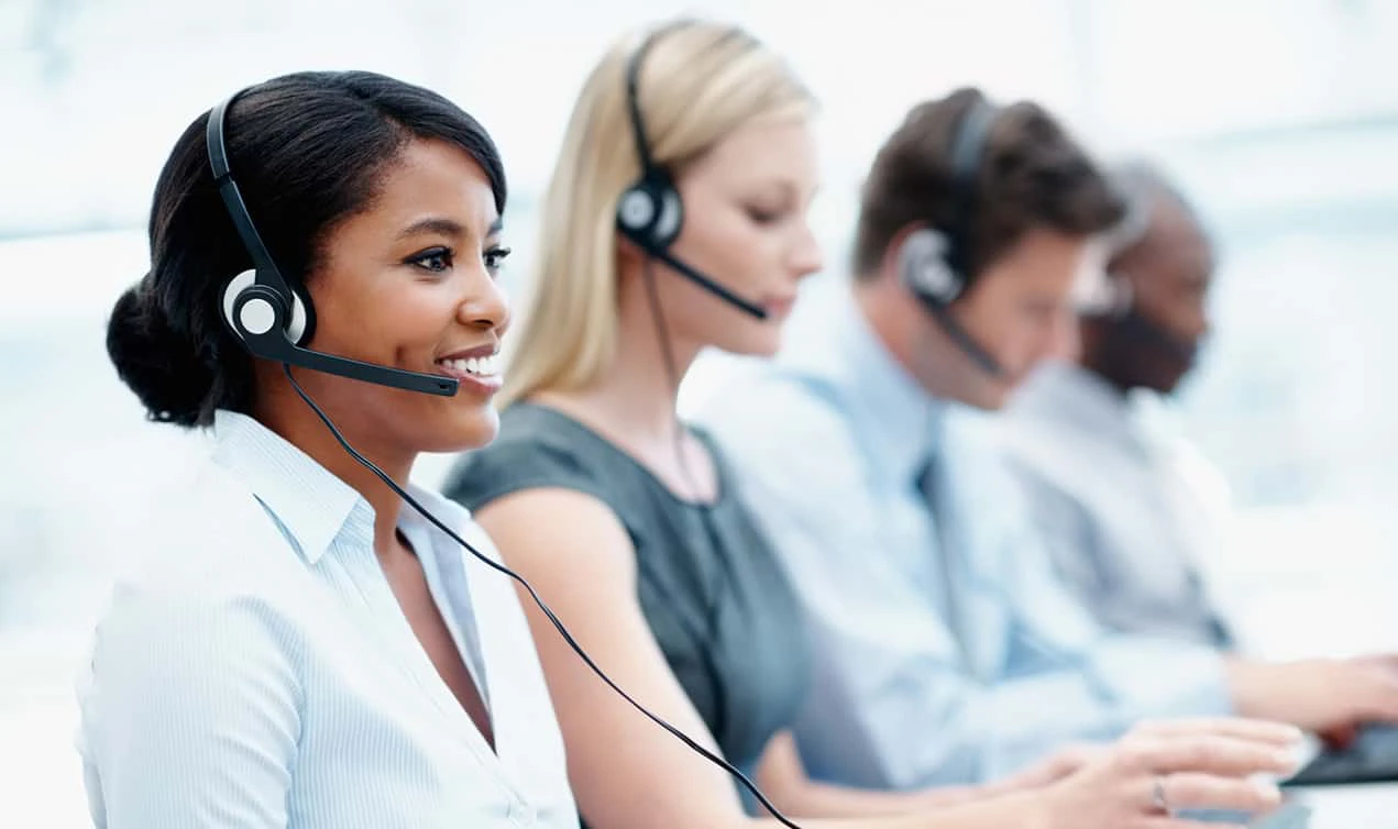 Four agents working in a contact center