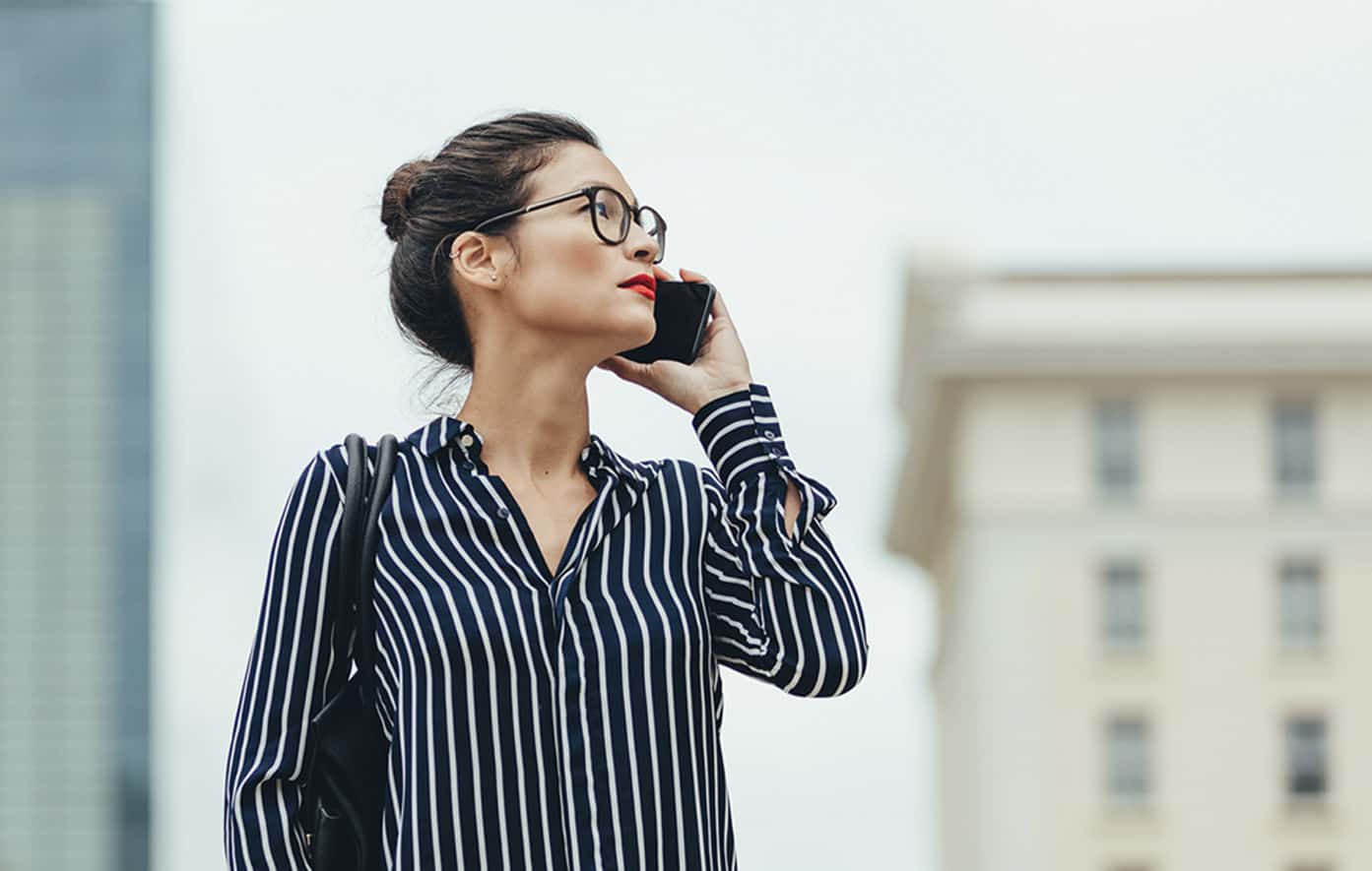 Woman standing outside talking on the phone