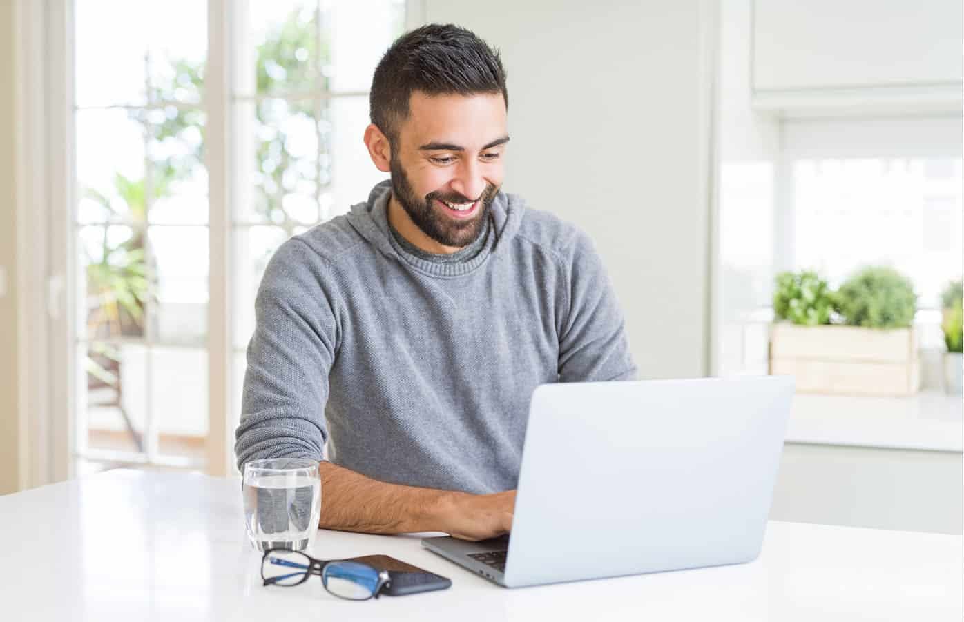 Man working from home on laptop