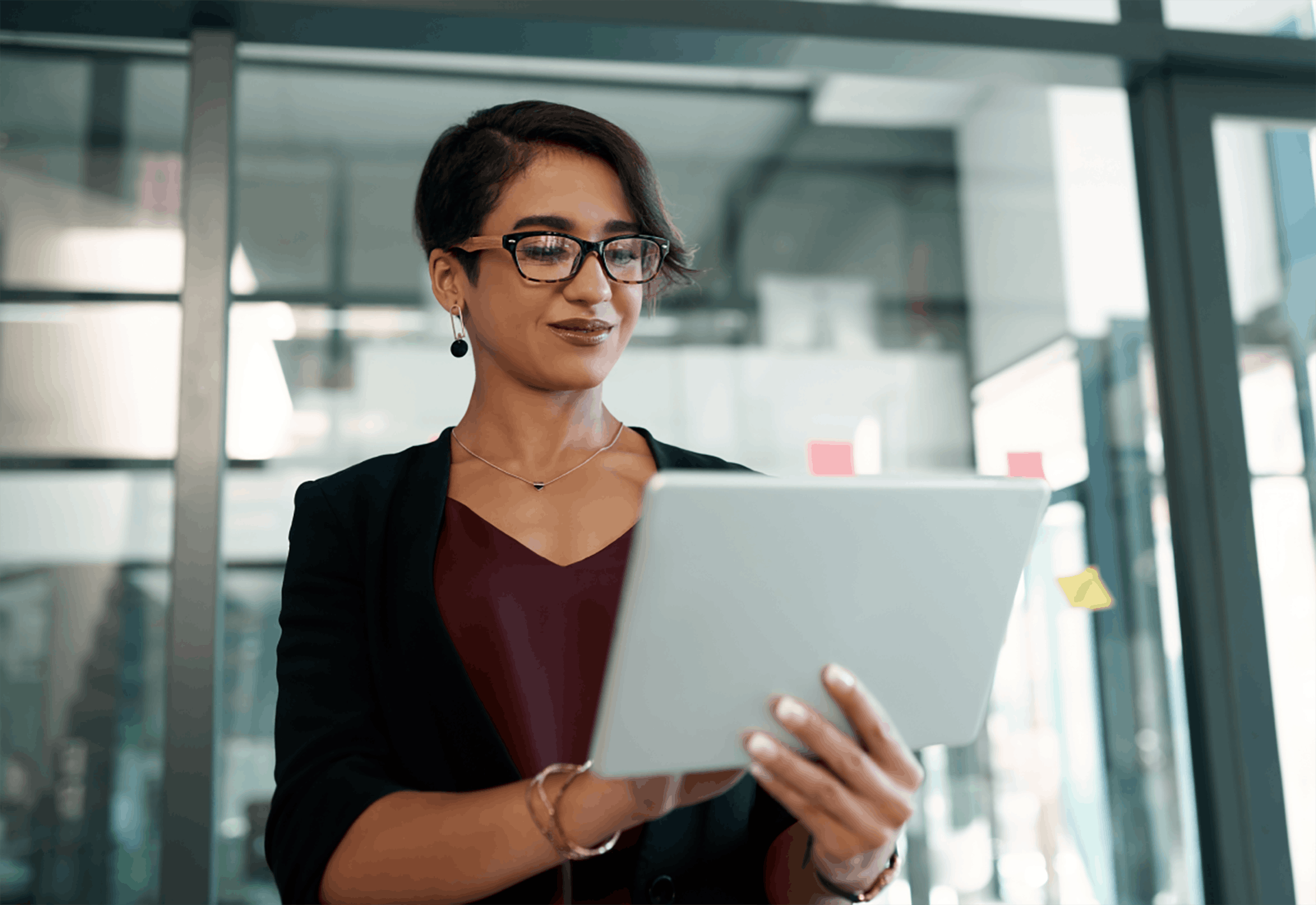 Woman in office using tablet