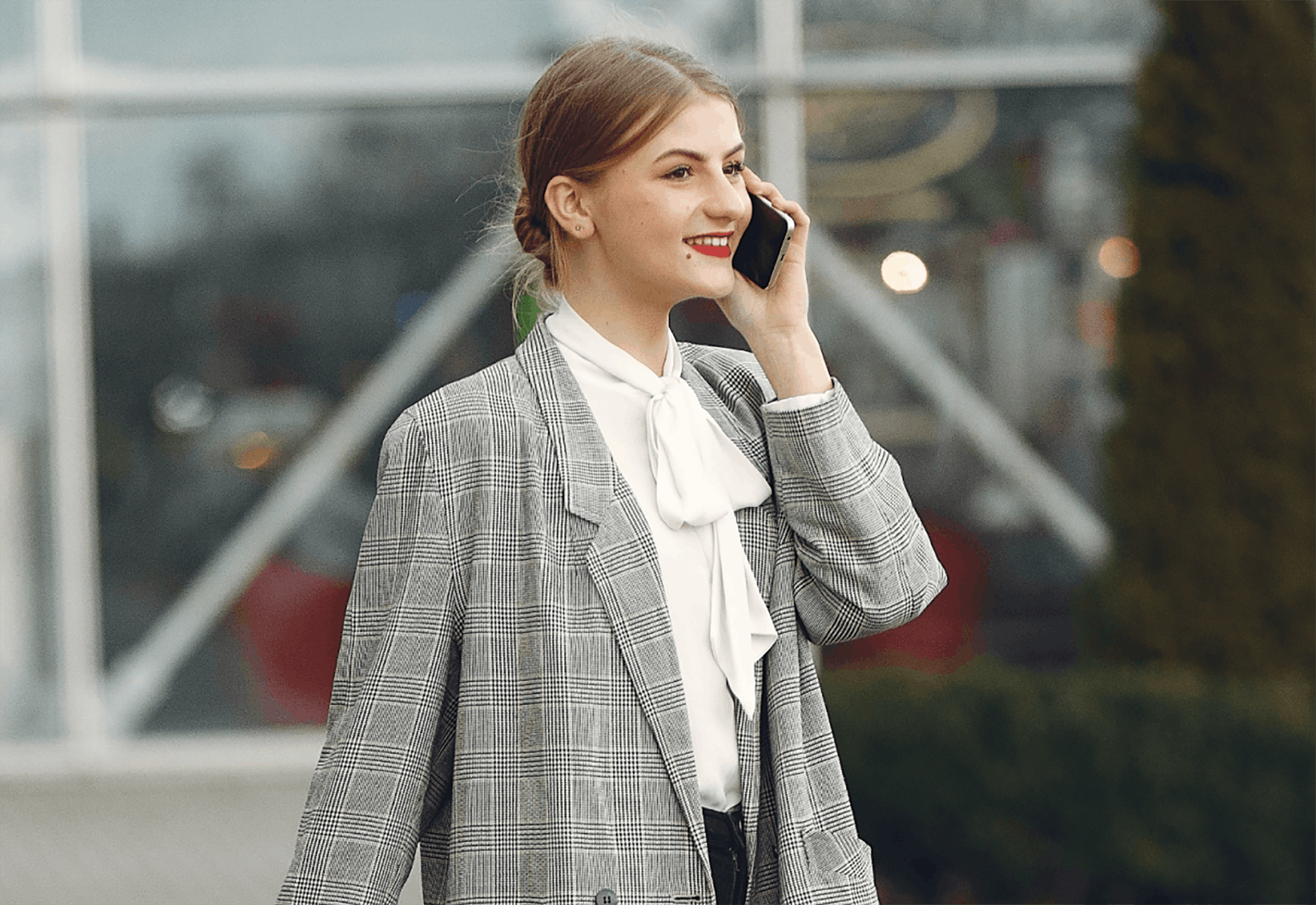 Woman talking on phone outside