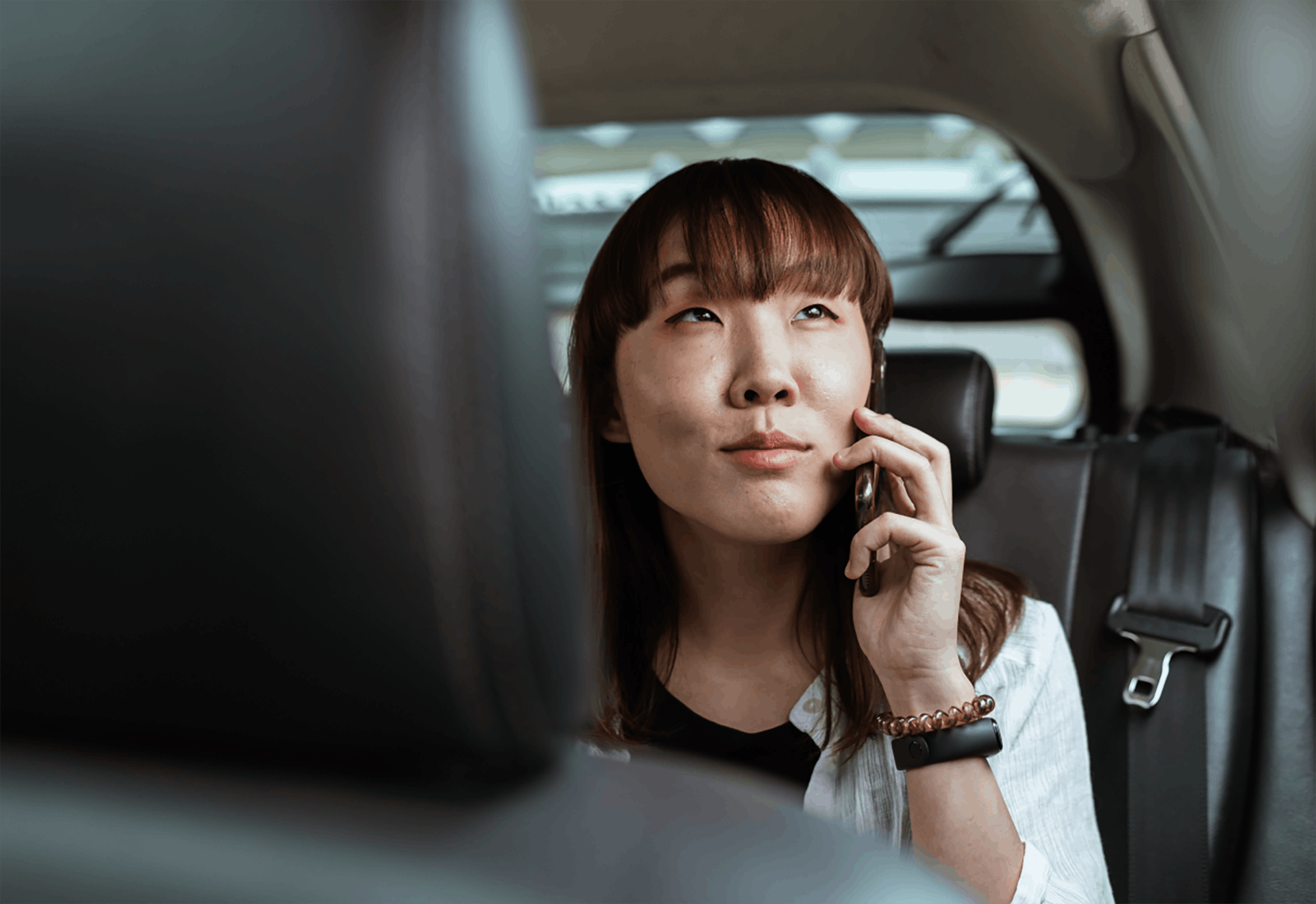 Woman traveling and talking on phone