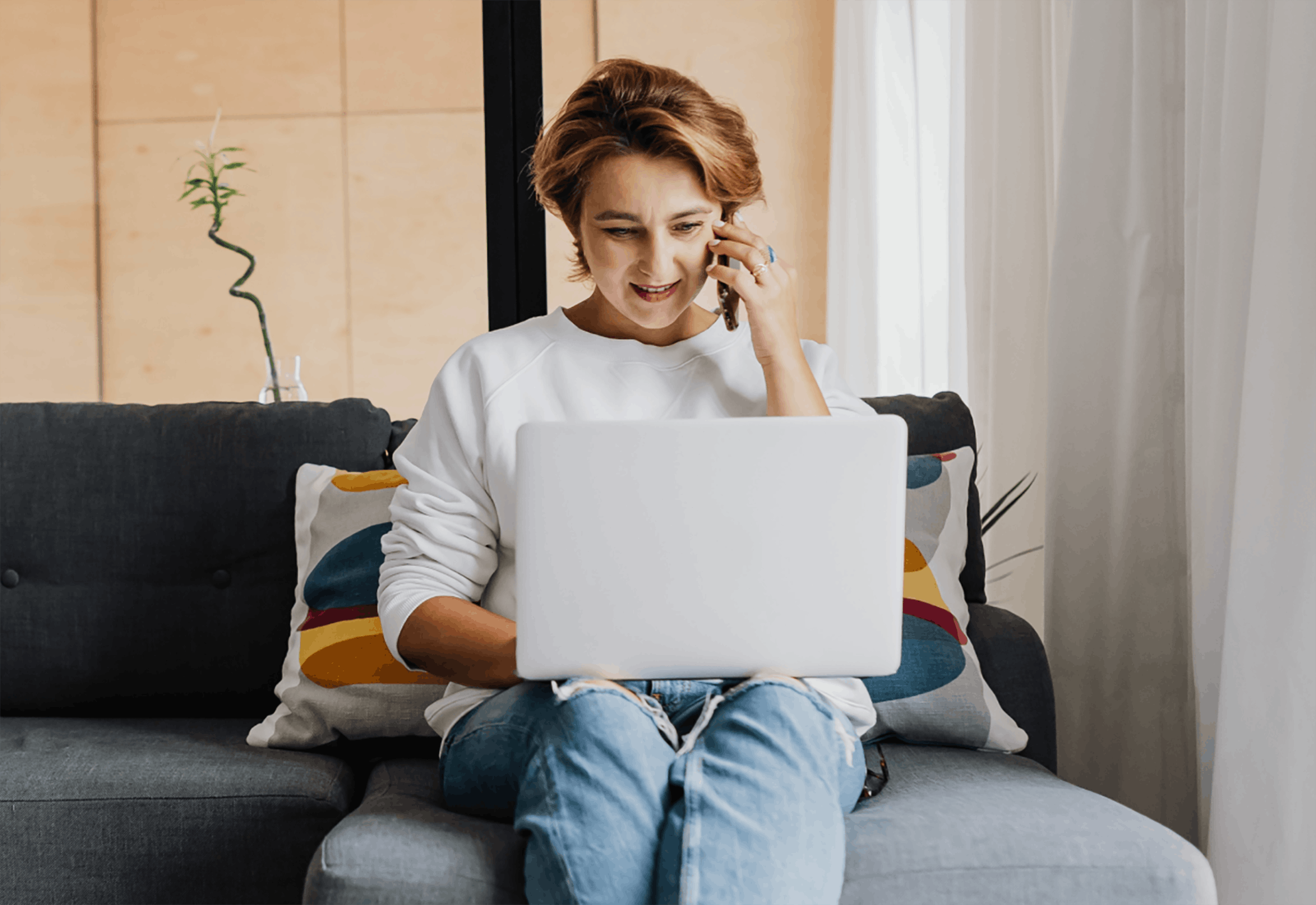 Woman working from home talking on phone