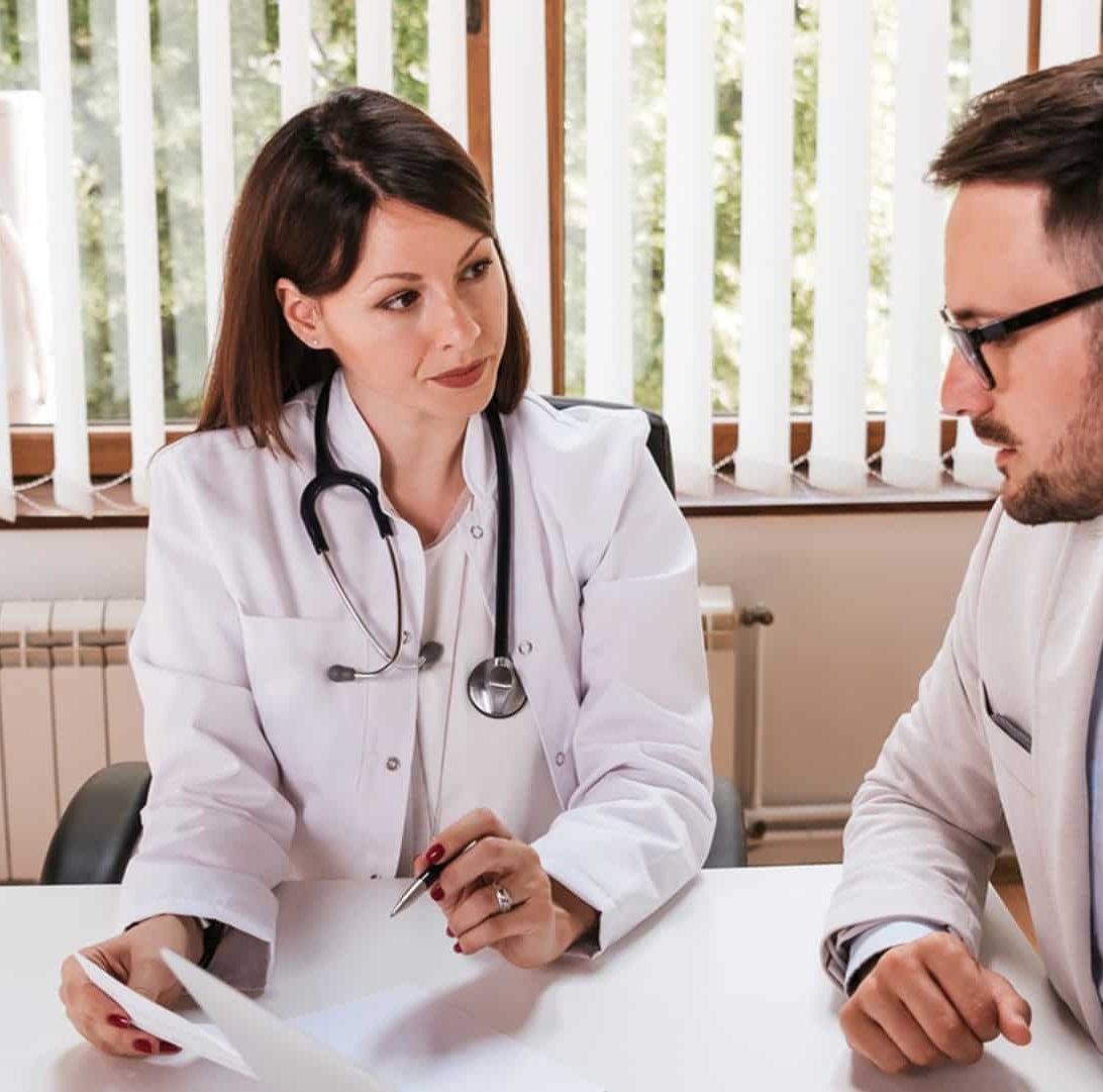 doctor talking to patient