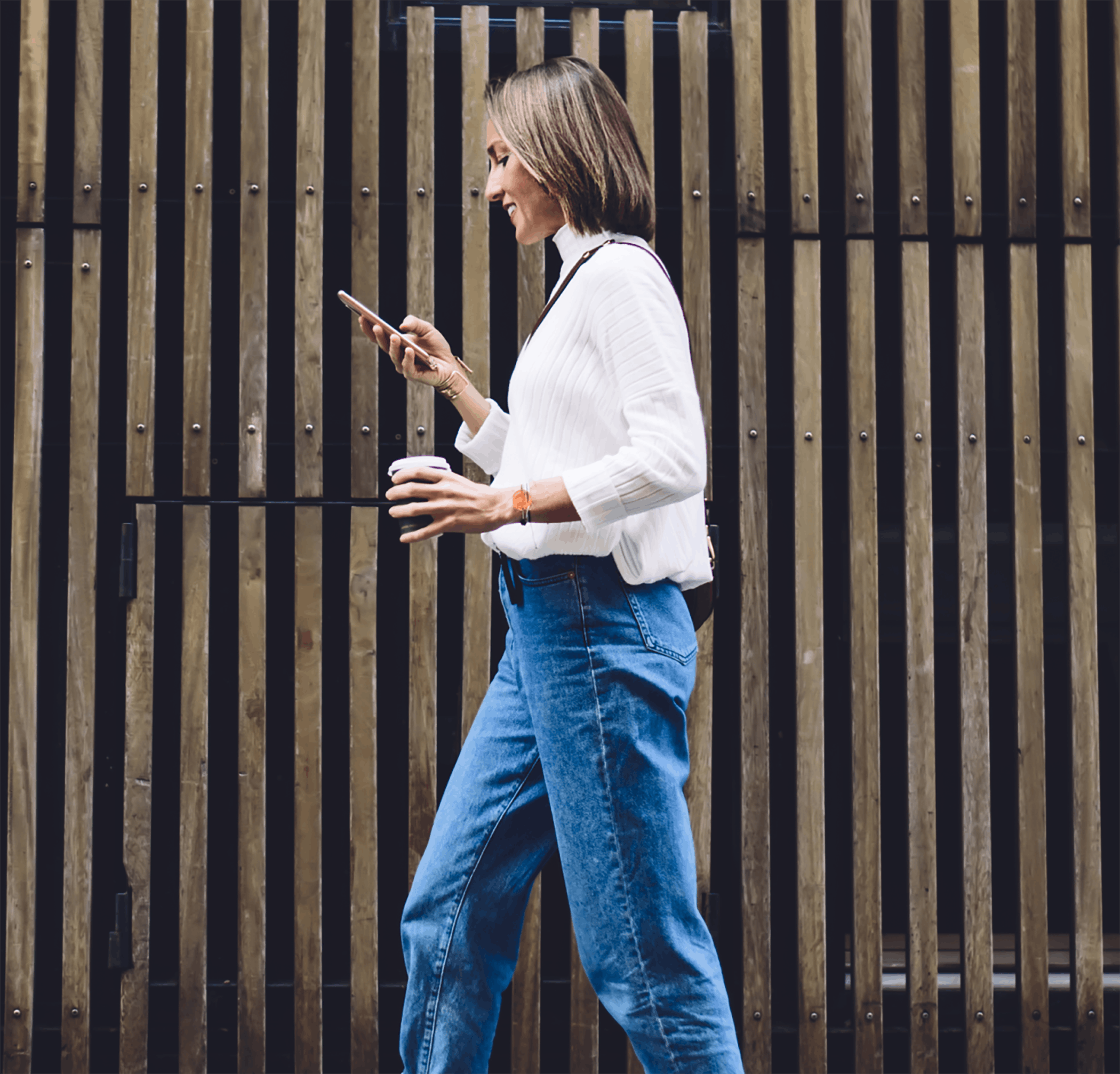 Woman walking while texting