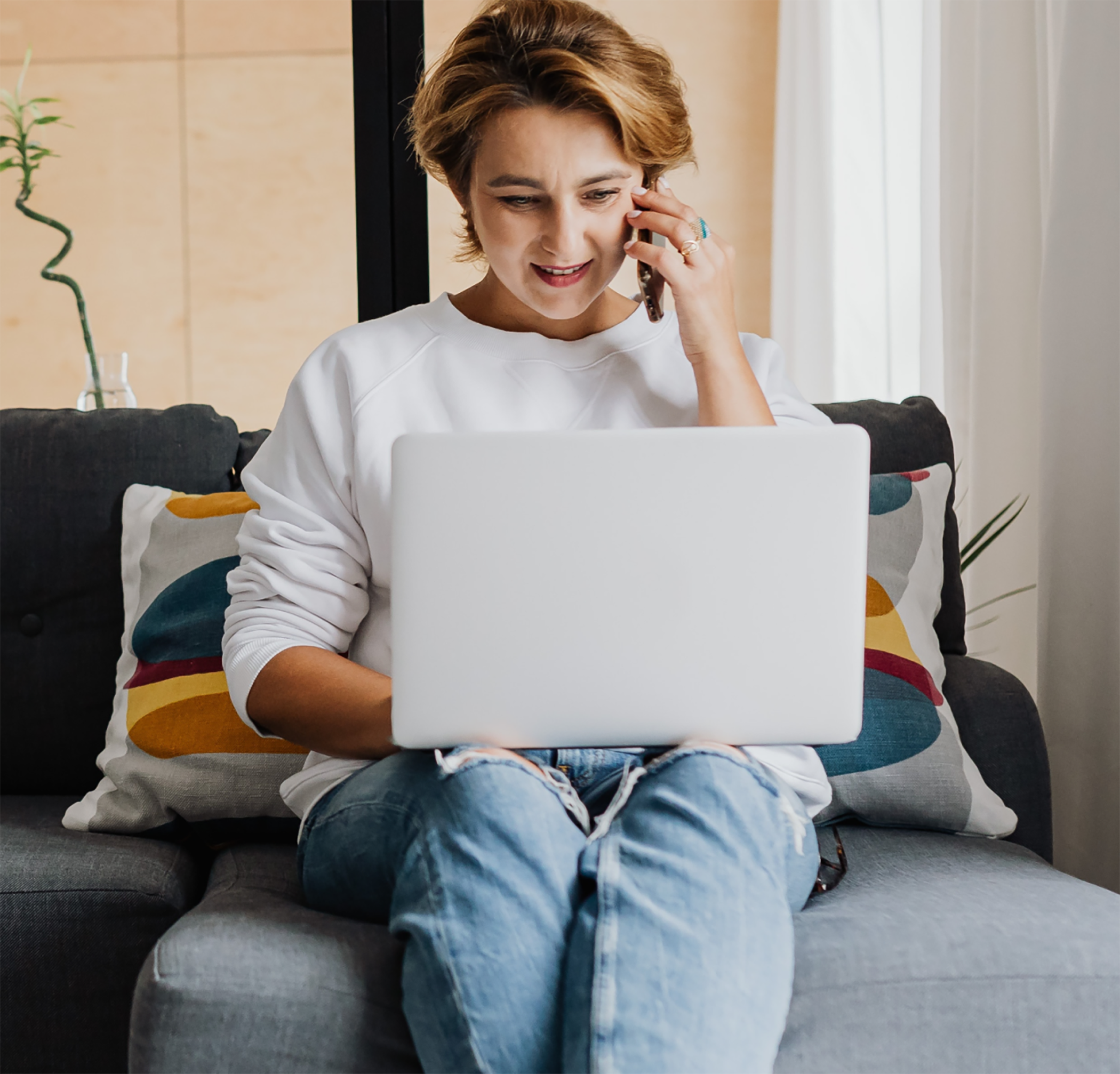 Woman Working on couch