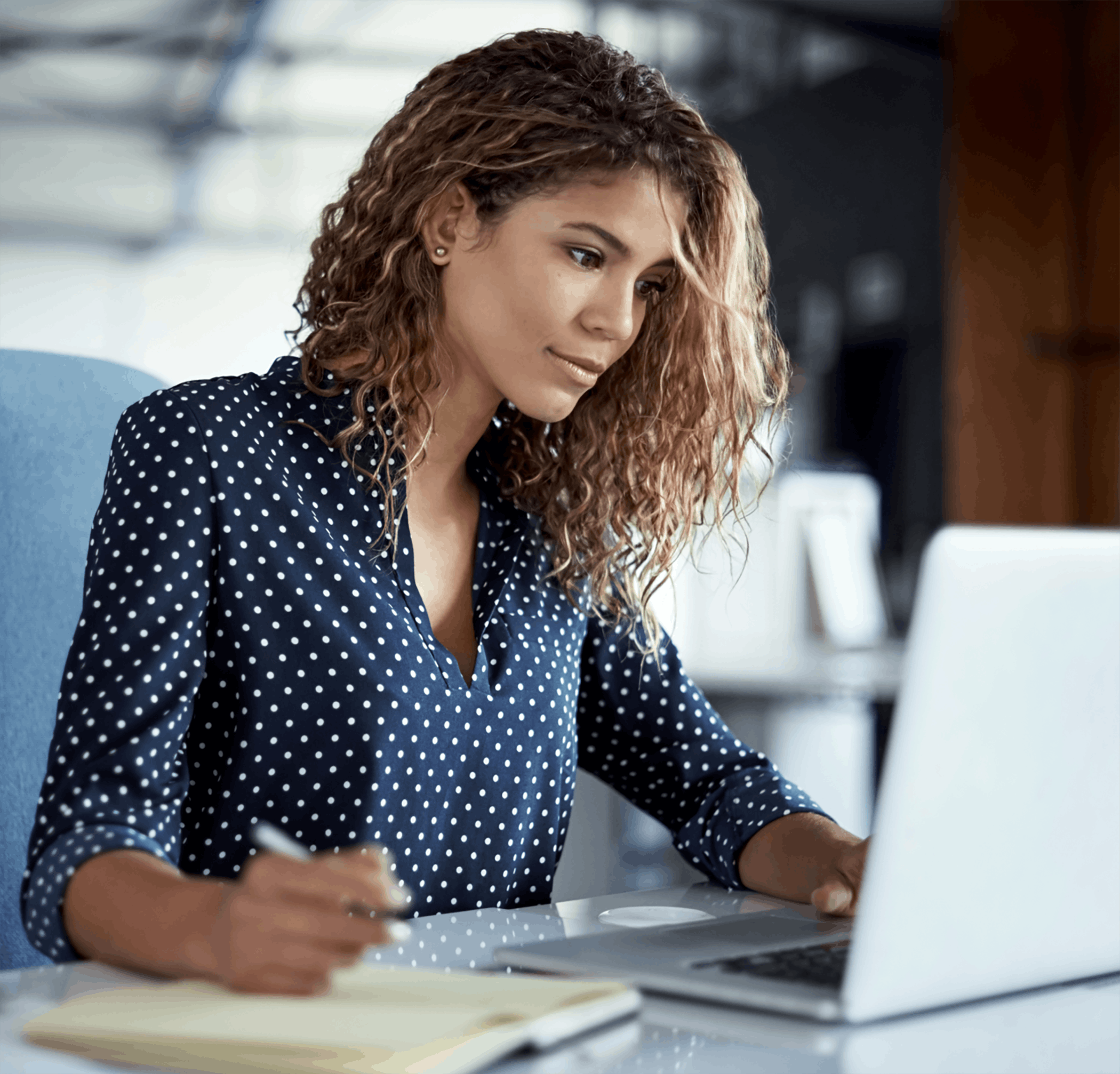 woman working on laptop in office