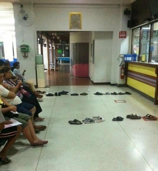 Customers holding place in line with their shoes.